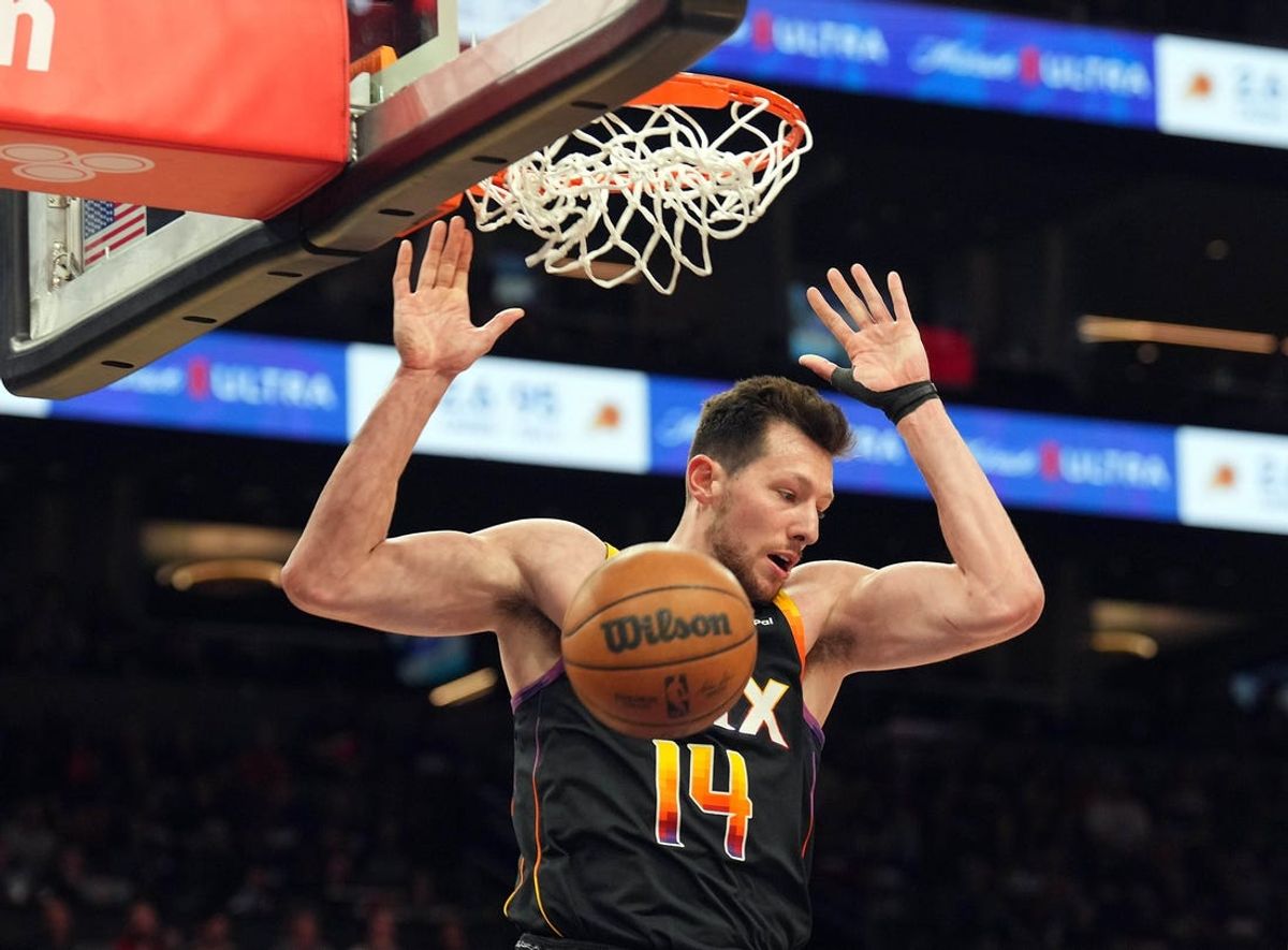 Apr 26, 2024; Phoenix, Arizona, USA; Phoenix Suns forward Drew Eubanks (14) dunks against the Minnesota Timberwolves during the second half of game three of the first round for the 2024 NBA playoffs at Footprint Center. Mandatory Credit: Joe Camporeale-USA TODAY Sports