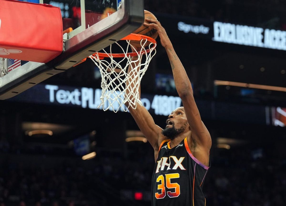 Apr 26, 2024; Phoenix, Arizona, USA; Phoenix Suns forward Kevin Durant (35) dunks against the Minnesota Timberwolves during the second half of game three of the first round for the 2024 NBA playoffs at Footprint Center. Mandatory Credit: Joe Camporeale-USA TODAY Sports