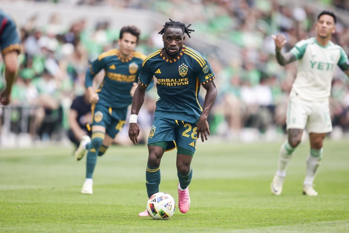 Apr 27, 2024; Austin, Texas, USA;  LA Galaxy forward Joseph Paintsil (28) brings the ball upfield during the match against Austin FC at Q2 Stadium. Mandatory Credit: Erich Schlegel-USA TODAY Sports