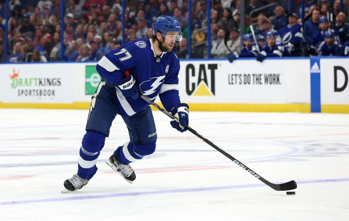 Apr 27, 2024; Tampa, Florida, USA; Tampa Bay Lightning defenseman Victor Hedman (77) skates with the puck against the Florida Panthers during the first period in game four of the first round of the 2024 Stanley Cup Playoffs at Amalie Arena. Mandatory Credit: Kim Klement Neitzel-USA TODAY Sports