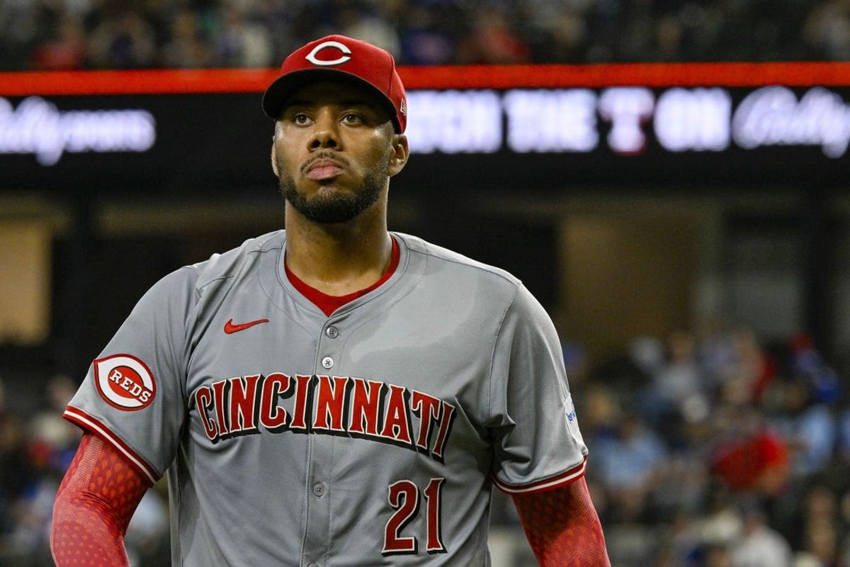 Apr 27, 2024; Arlington, Texas, USA; Cincinnati Reds starting pitcher Hunter Greene (21) comes off the field after pitching against the Texas Rangers during the sixth inning at Globe Life Field. Mandatory Credit: Jerome Miron-USA TODAY Sports