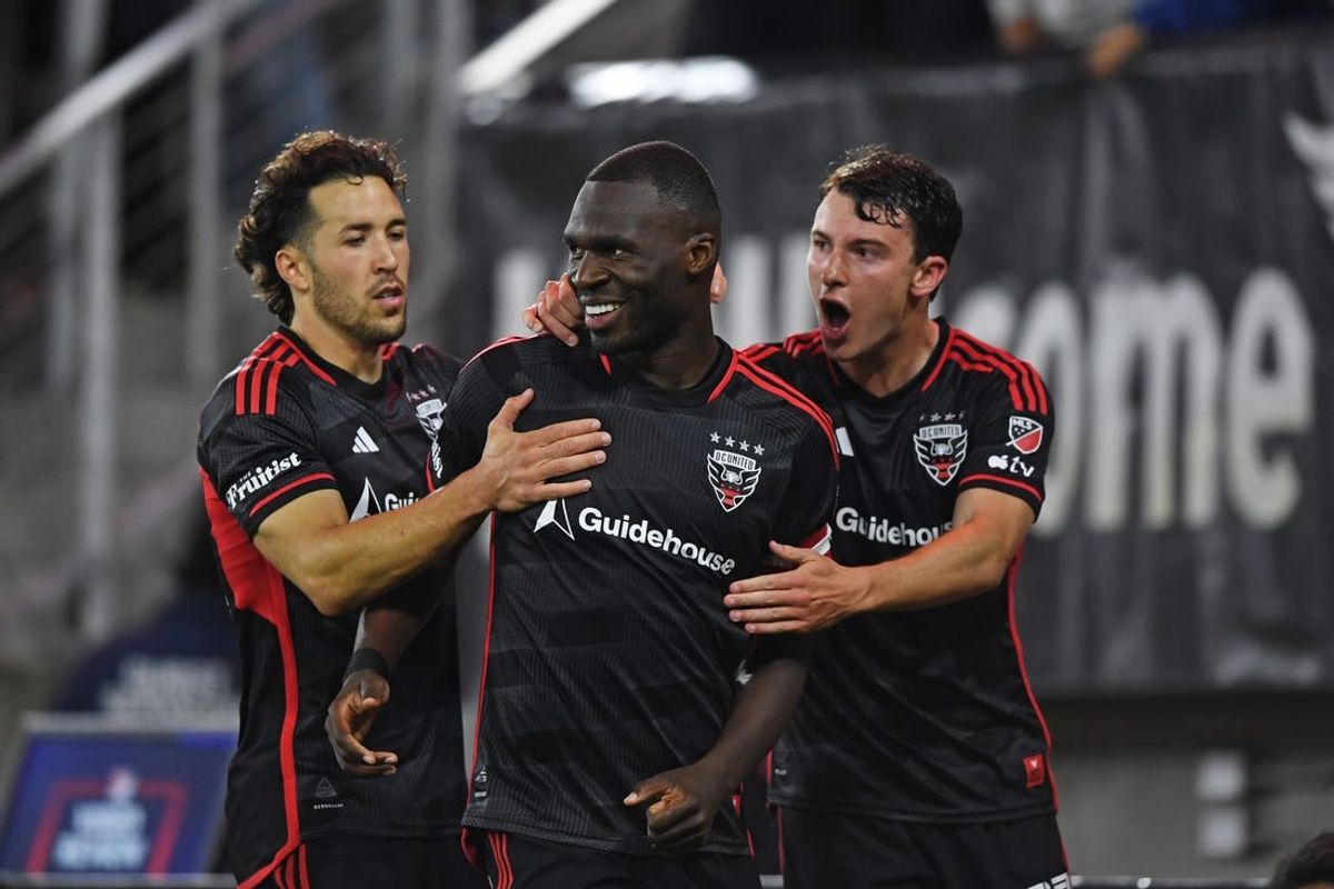 Apr 27, 2024; Washington, District of Columbia, USA; D.C. United forward Christian Benteke (20) celebrates with teammates after scoring a goal during the first half against Seattle Sounders FC at Audi Field. Mandatory Credit: Hannah Foslien-USA TODAY Sports