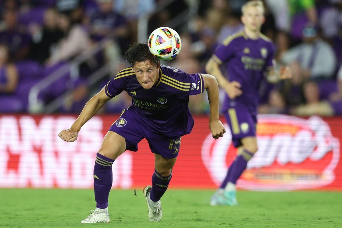 Apr 27, 2024; Orlando, Florida, USA; Orlando City defender Rodrigo Schlegel (15) heads the ball in the first half against Toronto FC at Inter&Co Stadium. Mandatory Credit: Nathan Ray Seebeck-USA TODAY Sports