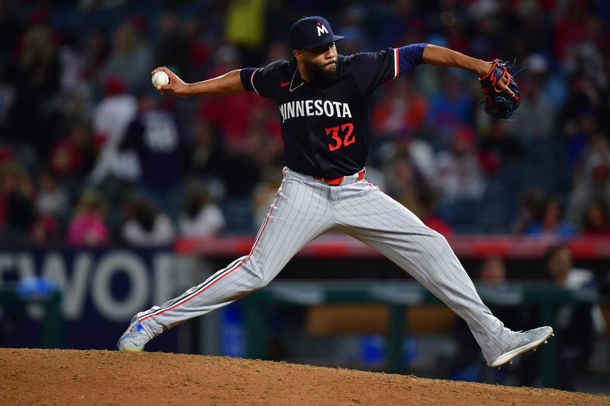 Apr 27, 2024; Anaheim, California, USA; Minnesota Twins pitcher Jay Jackson (32) throws against the Los Angeles Angels during the ninth inning at Angel Stadium. Mandatory Credit: Gary A. Vasquez-USA TODAY Sports