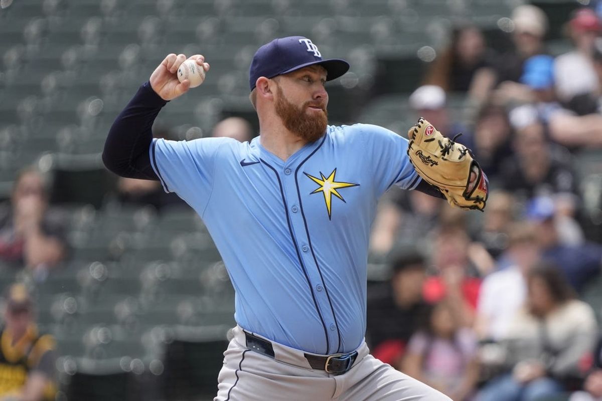 Apr 28, 2024; Chicago, Illinois, USA; Tampa Bay Rays pitcher Zack Littell (52) throws the ball against the Chicago White Sox during the first inning at Guaranteed Rate Field. Mandatory Credit: David Banks-USA TODAY Sports