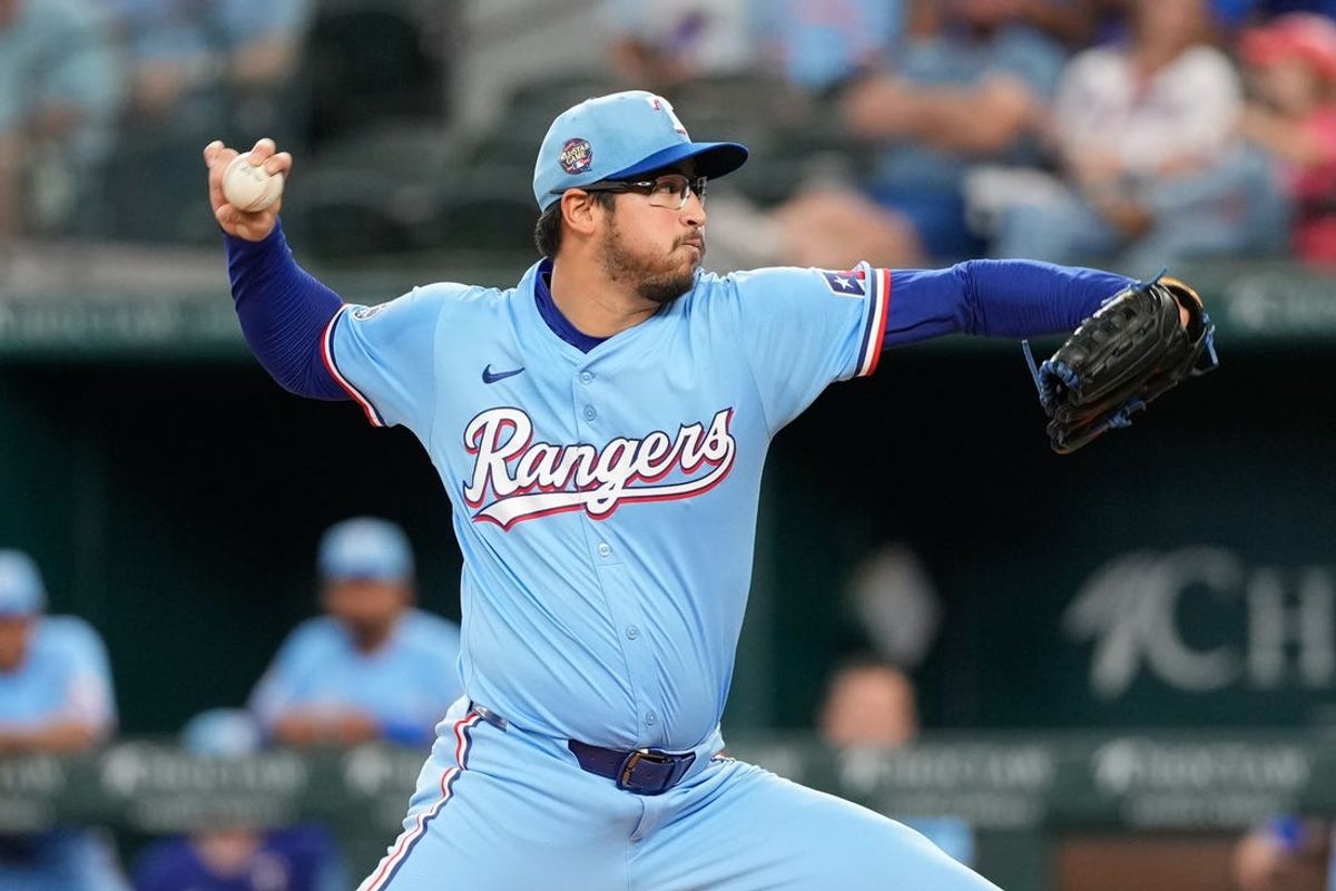 Apr 28, 2024; Arlington, Texas, USA; (Editors Notes: Caption Correction) Texas Rangers starting pitcher Dane Dunning (33) delivers a pitch to the Cincinnati Reds during the first inning at Globe Life Field. Mandatory Credit: Jim Cowsert-USA TODAY Sports