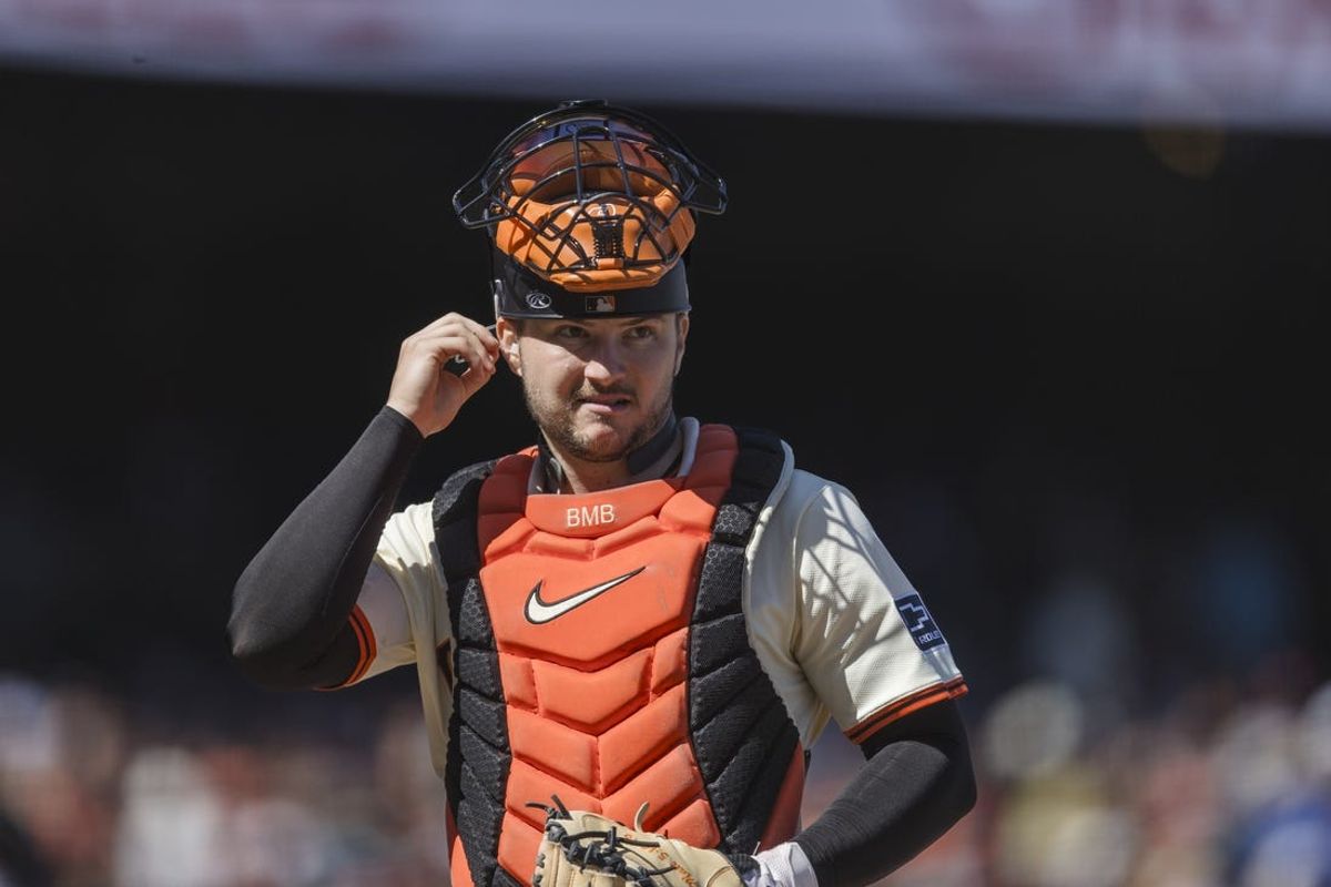 Apr 28, 2024; San Francisco, California, USA;  San Francisco Giants catcher Patrick Bailey (14) returns to the plate for the pitch against the Pittsburgh Pirates during the ninth inning at Oracle Park. Mandatory Credit: John Hefti-USA TODAY Sports