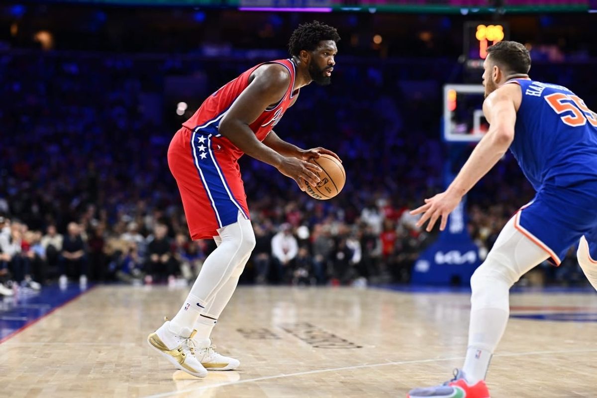 Jan 5, 2024; Philadelphia, Pennsylvania, USA; Philadelphia 76ers center Joel Embiid (21) controls the ball against the New York Knicks in the third quarter at Wells Fargo Center.