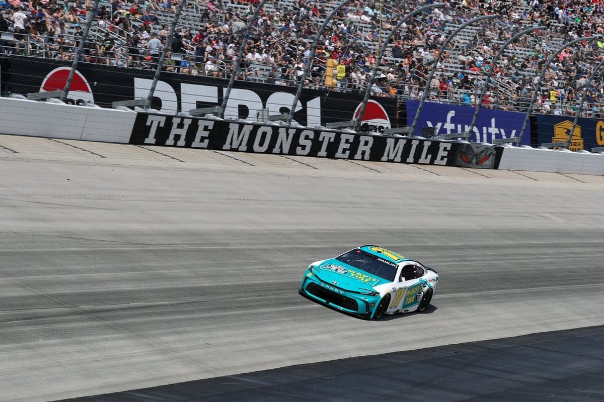 Apr 28, 2024; Dover, Delaware, USA; NASCAR Cup Series driver Denny Hamlin (11) races during the Wurth 400 at Dover Motor Speedway. Mandatory Credit: Matthew O'Haren-Imagn Images