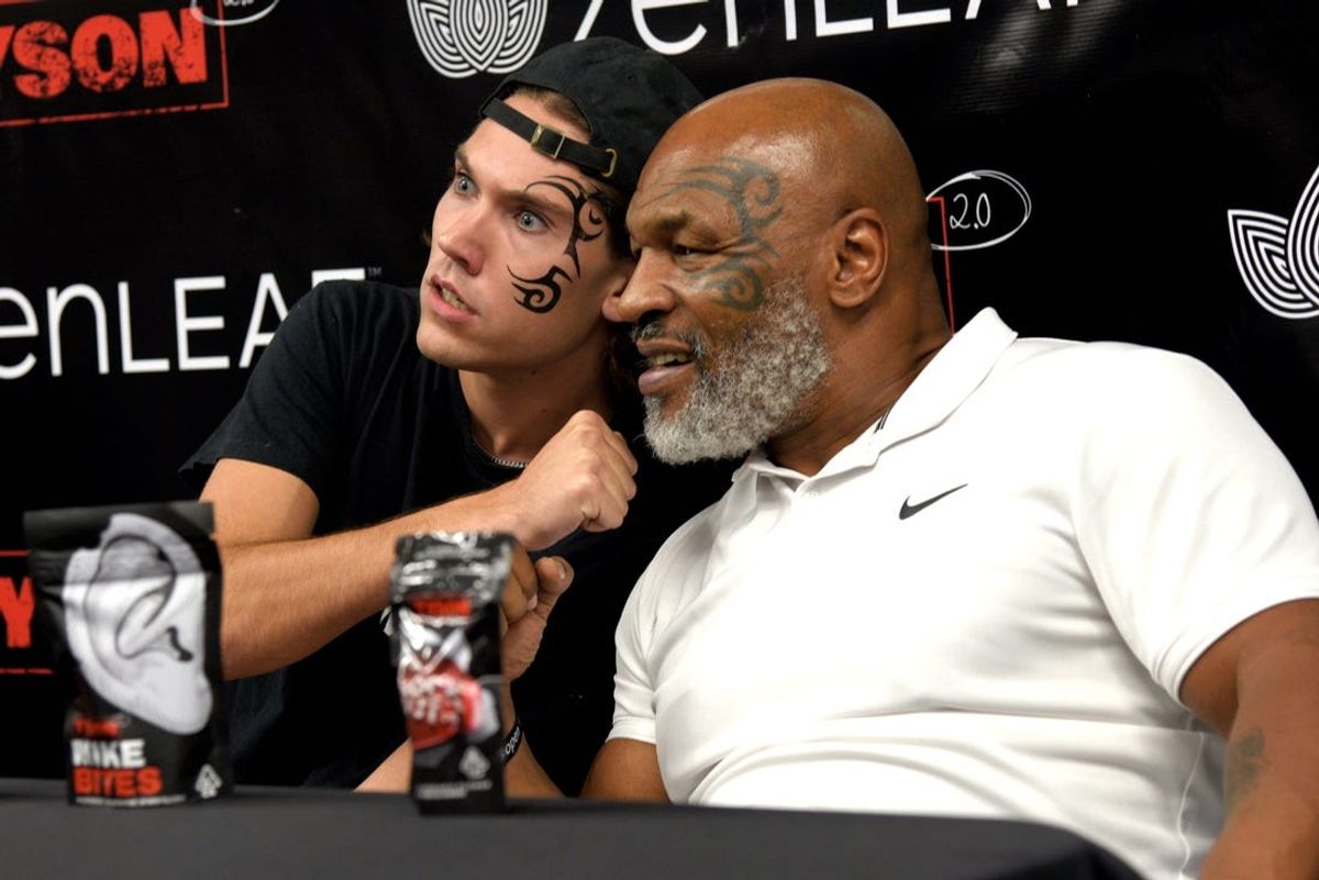 A fan takes a photo with Mike Tyson and TysonÃ¢â‚¬â„¢s cannabis Mike Bites at Zen Leaf in Neptune Township, New Jersey on Saturday, September 3, 2022. TysonÃ¢â‚¬â„¢s visit was to promote his cannabis brand Tyson 2.0 and retired professional wrestler Ric FlairÃ¢â‚¬â„¢s cannabis line Ric Flair Drip.