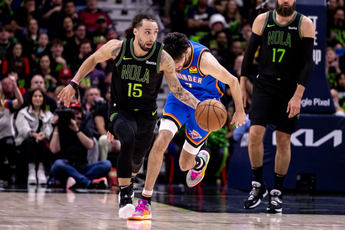 Apr 29, 2024; New Orleans, Louisiana, USA; New Orleans Pelicans guard Jose Alvarado (15) brings the ball up court against Oklahoma City Thunder forward Chet Holmgren (7) during the first half of game four of the first round for the 2024 NBA playoffs at Smoothie King Center. Mandatory Credit: Stephen Lew-Imagn Images