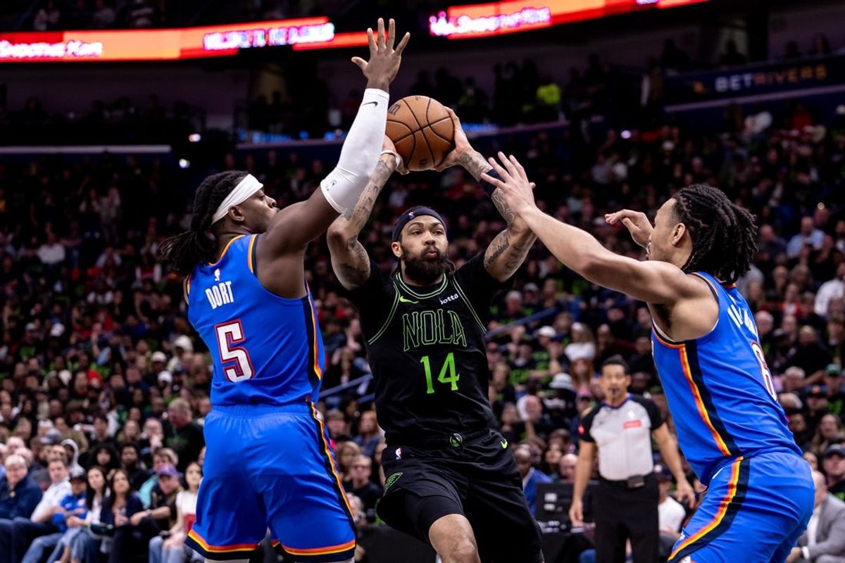 Apr 29, 2024; New Orleans, Louisiana, USA; New Orleans Pelicans forward Brandon Ingram (14) dribbles against Oklahoma City Thunder guard Luguentz Dort (5) during the first half of game four of the first round for the 2024 NBA playoffs at Smoothie King Center. Mandatory Credit: Stephen Lew-USA TODAY Sports