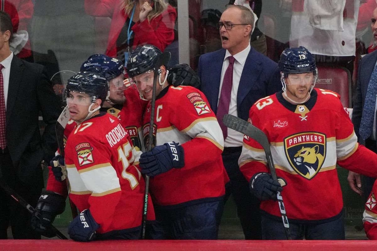 Apr 29, 2024; Sunrise, Florida, USA; Florida Panthers center Aleksander Barkov (16) and right wing Vladimir Tarasenko (10) celebrate advancing to the second round of the playoffs as head coach Paul Maurice looks on against the Tampa Bay Lightning in game five of the first round of the 2024 Stanley Cup Playoffs at Amerant Bank Arena. Mandatory Credit: Jim Rassol-USA TODAY Sports