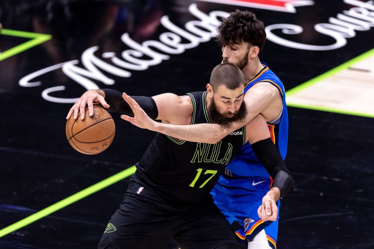 Apr 29, 2024; New Orleans, Louisiana, USA; New Orleans Pelicans center Jonas Valanciunas (17) drives into Oklahoma City Thunder forward Chet Holmgren (7) during game four of the first round for the 2024 NBA playoffs at Smoothie King Center. Mandatory Credit: Stephen Lew-USA TODAY Sports