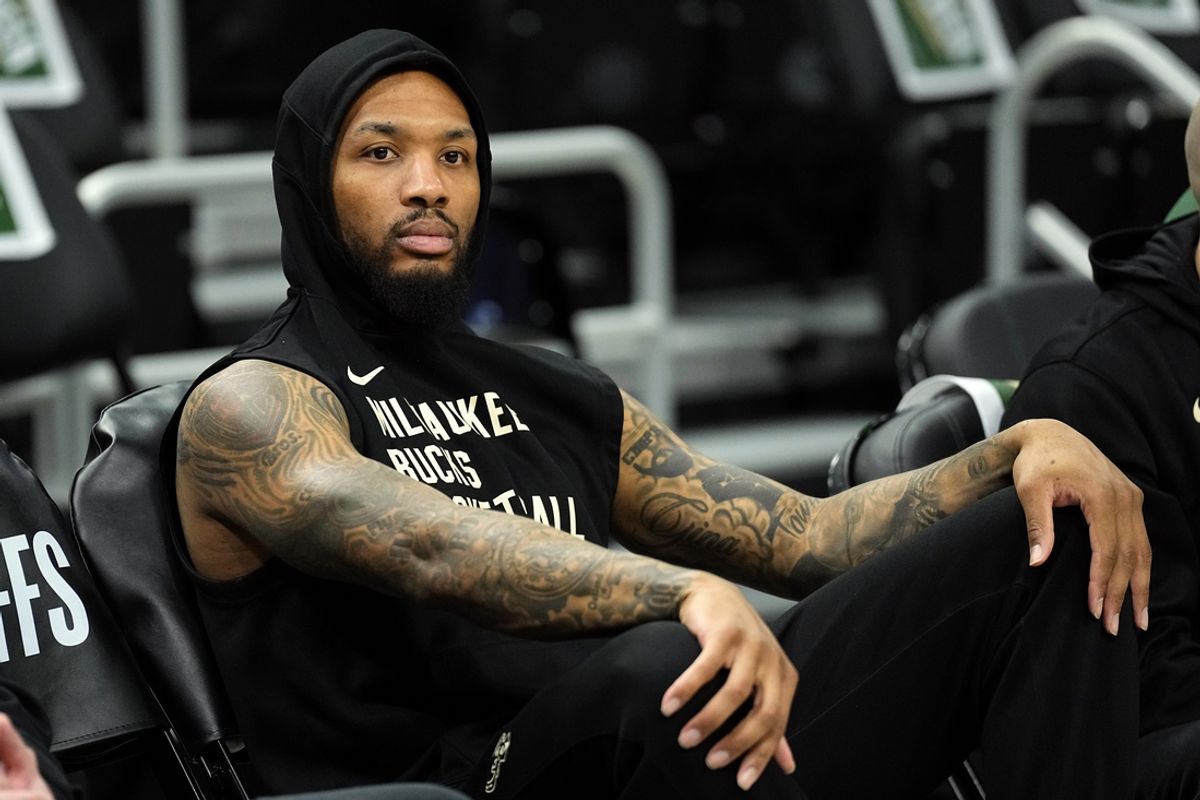 Wisconsin, USA;  Milwaukee Bucks guard Damian Lillard (0) looks on during warmups prior to game five of the first round for the 2024 NBA playoffs against the Indiana Pacers at Fiserv Forum. Mandatory Credit: Jeff Hanisch-Imagn Images