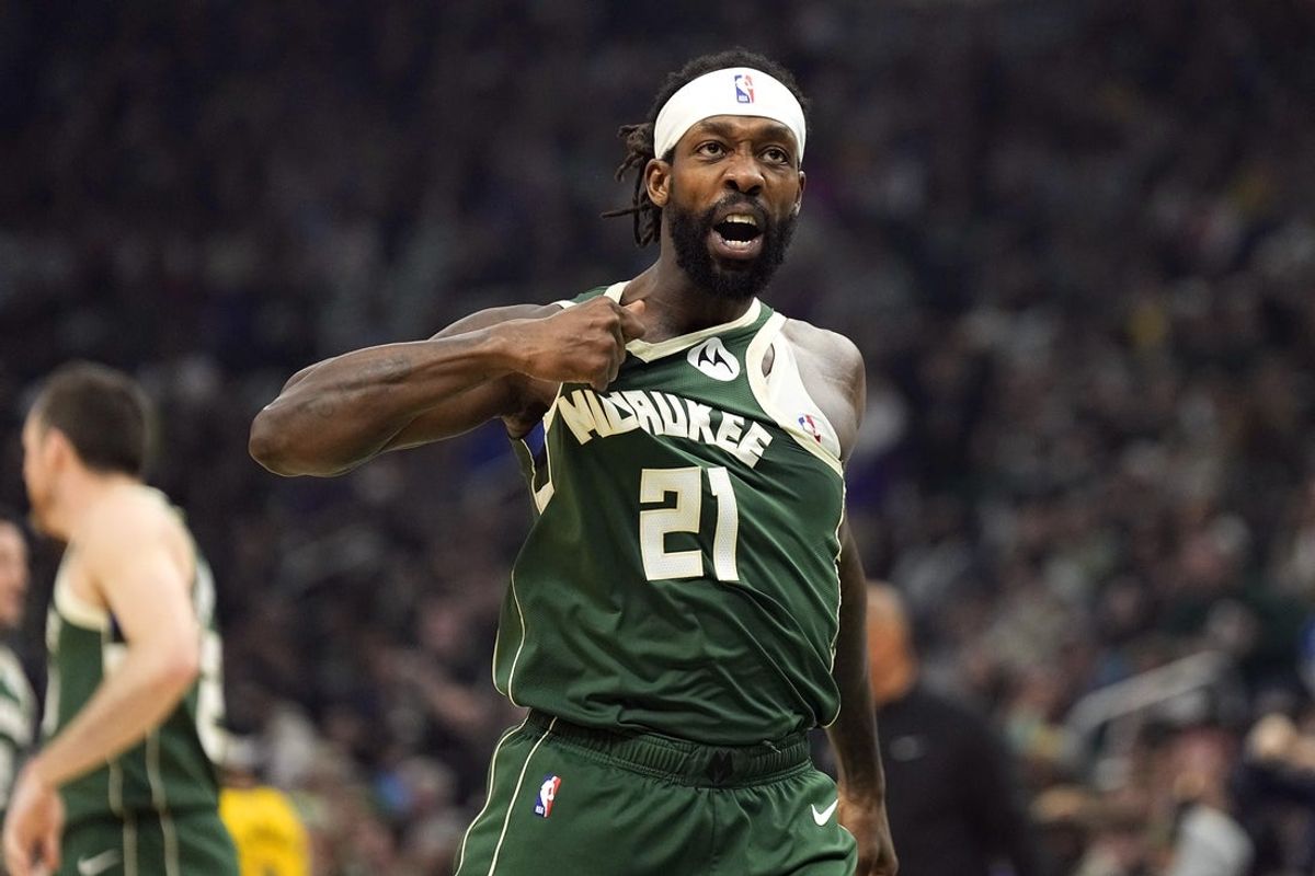 Apr 30, 2024; Milwaukee, Wisconsin, USA;  Milwaukee Bucks guard Patrick Beverley (21) gestures towards the crowd following a play during the second quarter against the Indiana Pacers during game five of the first round for the 2024 NBA playoffs at Fiserv Forum. Mandatory Credit: Jeff Hanisch-Imagn Images