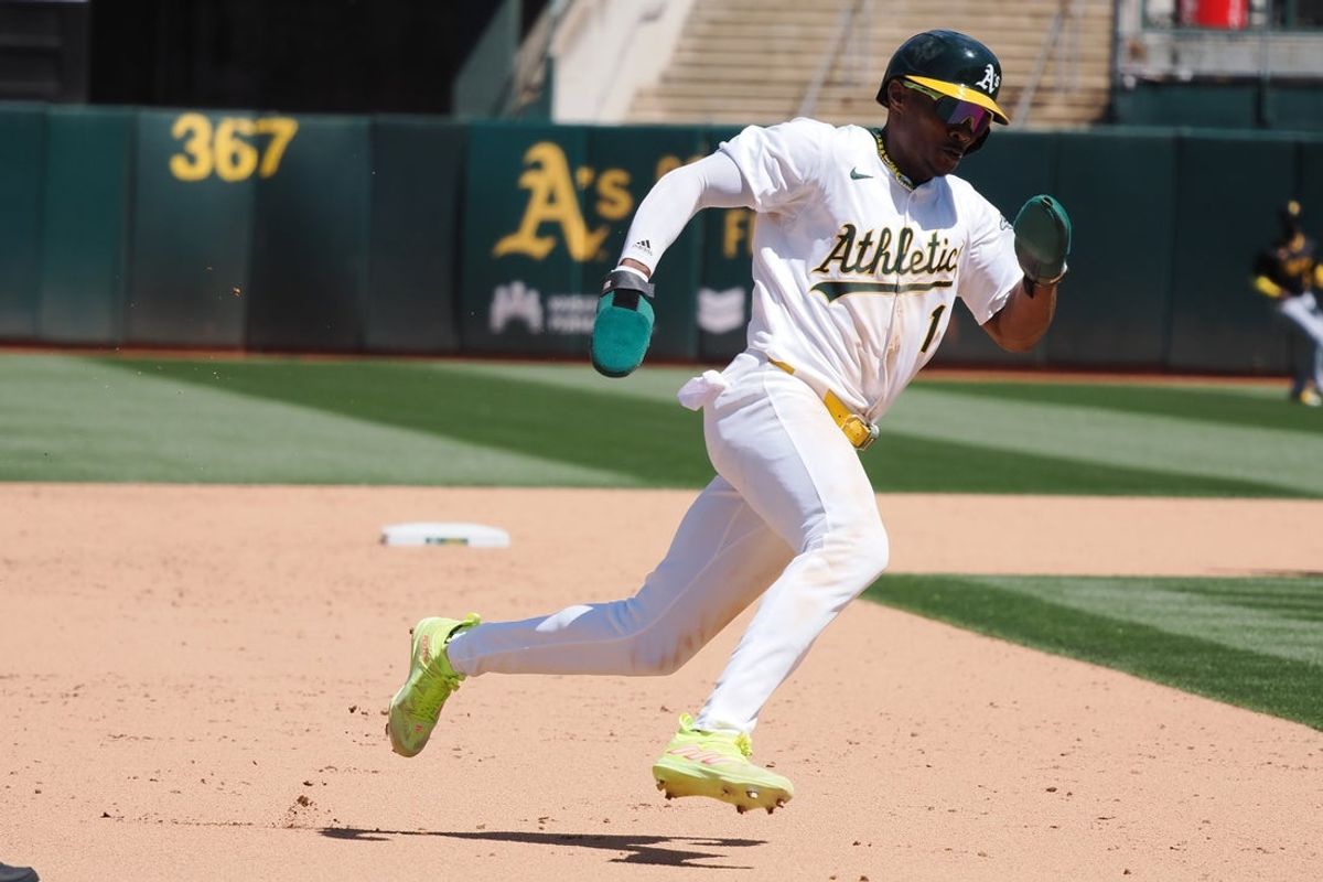 May 1, 2024; Oakland, California, USA; Oakland Athletics center fielder Esteury Ruiz (1) rounds third base for a run against the Pittsburgh Pirates during the eighth inning at Oakland-Alameda County Coliseum. Mandatory Credit: Kelley L Cox-Imagn Images