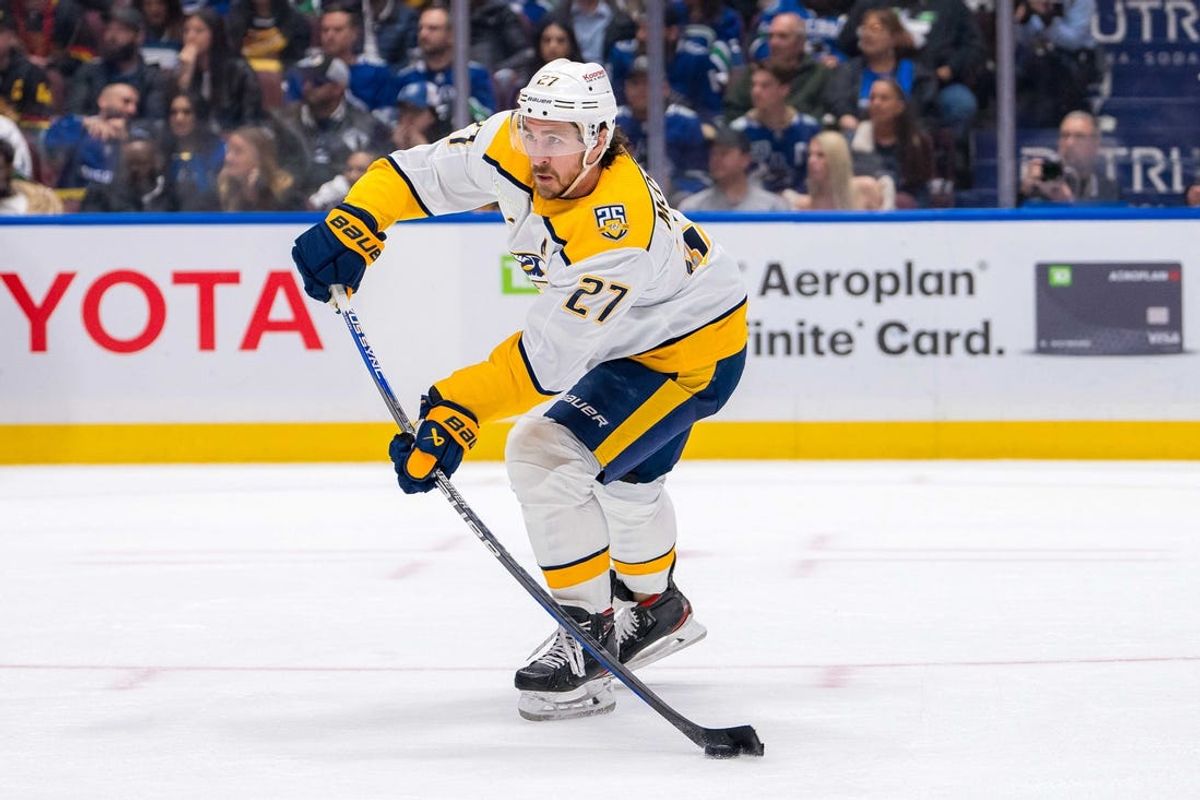 Apr 30, 2024; Vancouver, British Columbia, CAN; Nashville Predators defenseman Ryan McDonagh (27) makes a pass against the Vancouver Canucks during the first period in game five of the first round of the 2024 Stanley Cup Playoffs at Rogers Arena. Mandatory Credit: Bob Frid-USA TODAY Sports