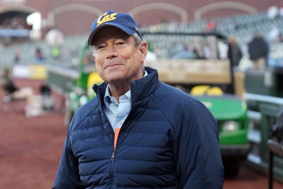 Apr 26, 2024; San Francisco, California, USA; University of California director of athletics Jim Knowlton stands on the field before the game between the San Francisco Giants and the Pittsburgh Pirates at Oracle Park. Mandatory Credit: Darren Yamashita-Imagn Images