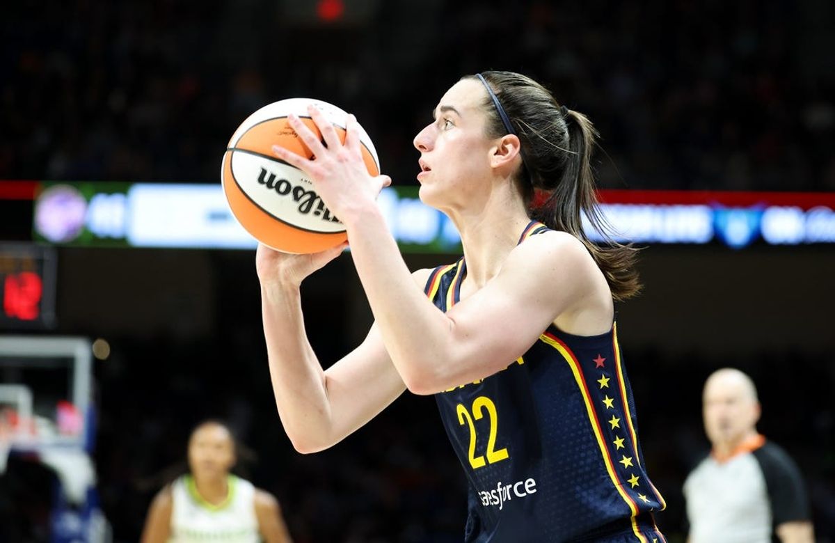 May 3, 2024; Dallas, Texas, USA; Indiana Fever guard Caitlin Clark (22) shoots during the second quarter against the Dallas Wings at College Park Center.  Mandatory Credit: Kevin Jairaj-USA TODAY Sports