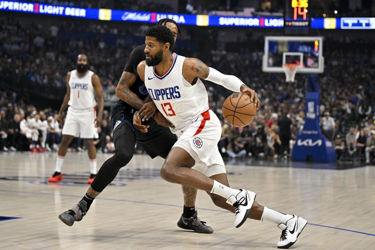 May 3, 2024; Dallas, Texas, USA; LA Clippers forward Paul George (13) drives to the basket against the Dallas Mavericks during the first quarter during game six of the first round for the 2024 NBA playoffs at American Airlines Center. Mandatory Credit: Jerome Miron-USA TODAY Sports