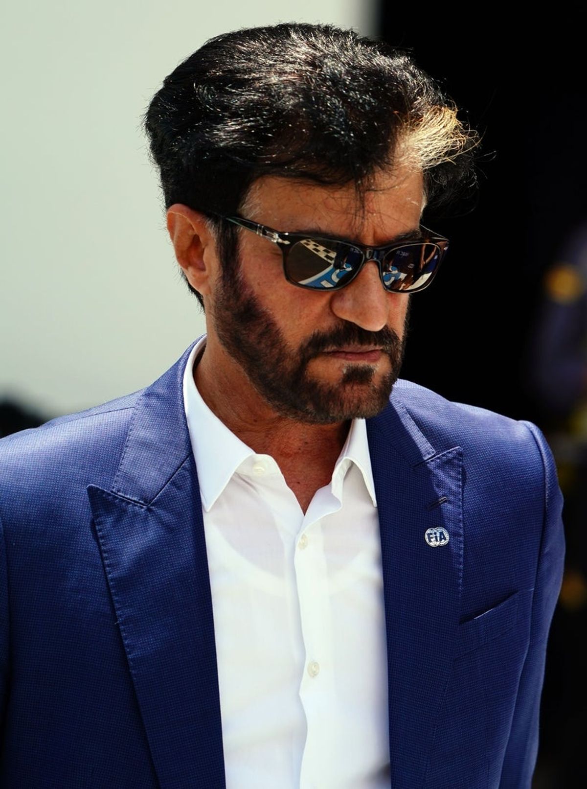 May 4, 2024; Miami Gardens, Florida, USA; FIA president Mohammed Ben Sulayem walks through the paddock after the F1 Sprint Race at Miami International Autodrome. Mandatory Credit: John David Mercer-Imagn Images