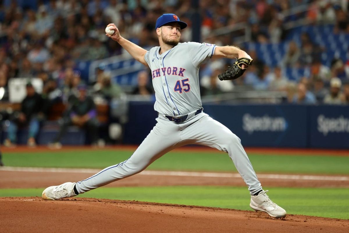 May 4, 2024; St. Petersburg, Florida, USA;  New York Mets starting pitcher Christian Scott (45) throws a pitch against the Tampa Bay Rays during the first inning at Tropicana Field. Mandatory Credit: Kim Klement Neitzel-USA TODAY Sports