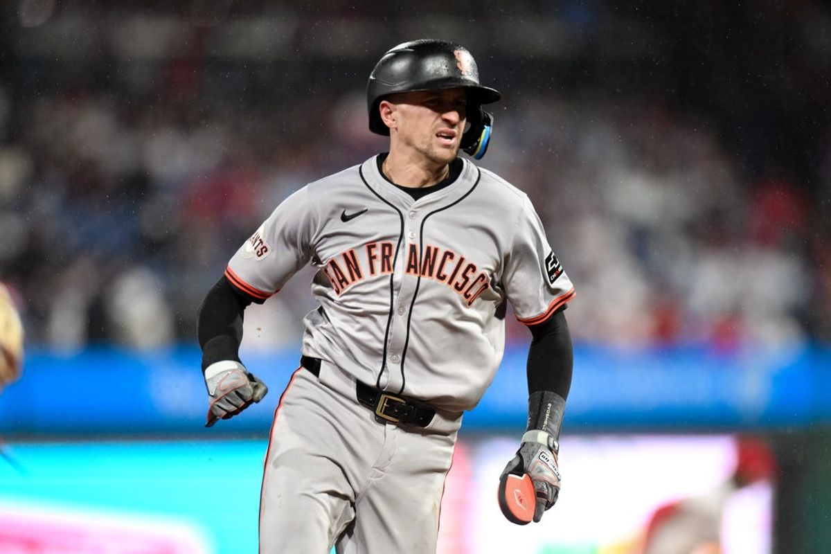 May 4, 2024; Philadelphia, Pennsylvania, USA; San Francisco Giants shortstop Nick Ahmed (16) advances to third base on a single by San Francisco Giants outfielder Austin Slater (not pictured) during the third inning against the Philadelphia Phillies at Citizens Bank Park. Mandatory Credit: John Jones-USA TODAY Sports