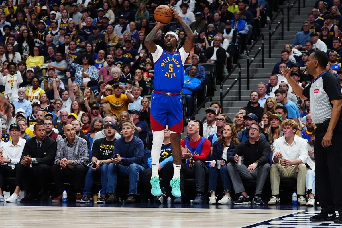 May 4, 2024; Denver, Colorado, USA; Denver Nuggets guard Kentavious Caldwell-Pope (5) shoots the ball in the second half against the Minnesota Timberwolves during game one of the second round for the 2024 NBA playoffs at Ball Arena. Mandatory Credit: Ron Chenoy-USA TODAY Sports