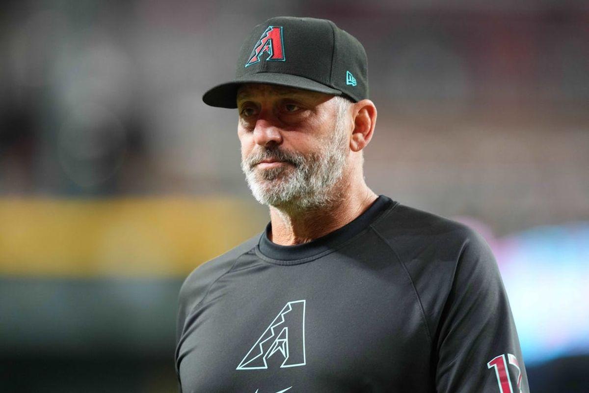 May 4, 2024; Phoenix, Arizona, USA; Arizona Diamondbacks manager Torey Lovullo (17) looks on against the San Diego Padres  during the seventh inning at Chase Field. Mandatory Credit: Joe Camporeale-USA TODAY Sports