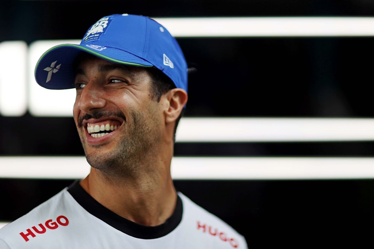 May 5, 2024; Miami Gardens, Florida, USA; RB driver Daniel Ricciardo (3) walks in the paddock before the F1 Miami Grand Prix at Miami International Autodrome. Mandatory Credit: Peter Casey-Imagn Images