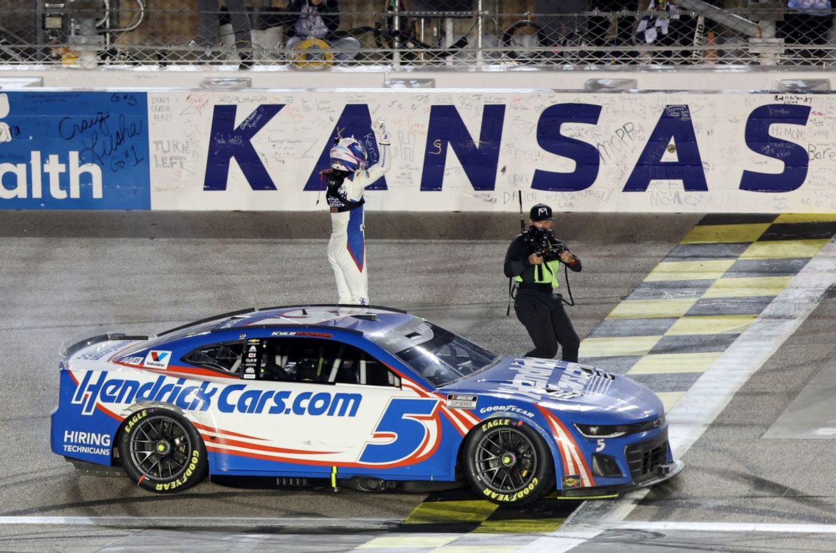 May 5, 2024; Kansas City, Kansas, USA;  NASCAR Cup Series driver Kyle Larson (5) wins the Advent Health 400 at the Kansas Speedway. Mandatory Credit: Reese Strickland-Imagn Images