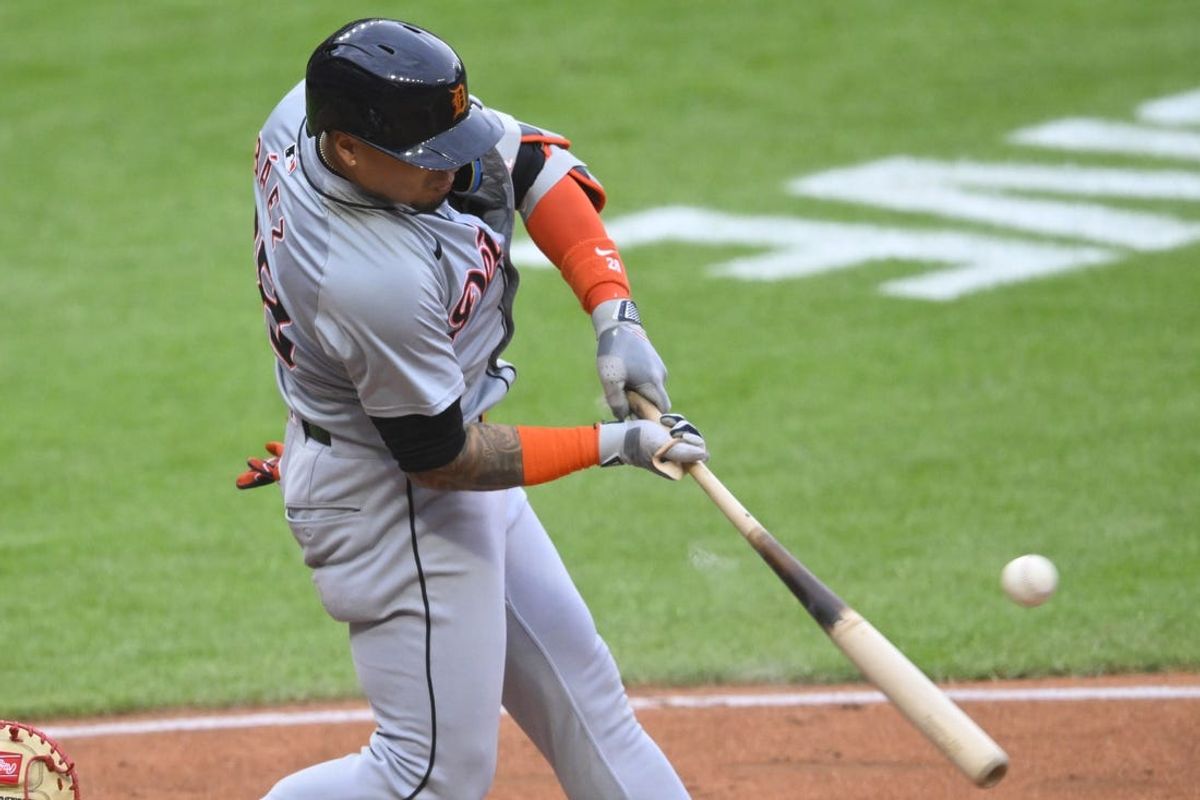 May 6, 2024; Cleveland, Ohio, USA; Detroit Tigers shortstop Javier Baez (28) singles in the fifth inning against the Cleveland Guardians at Progressive Field. Mandatory Credit: David Richard-USA TODAY Sports