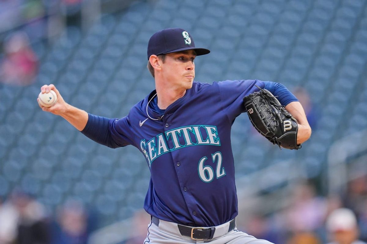 May 7, 2024; Minneapolis, Minnesota, USA; Seattle Mariners pitcher Emerson Hancock (62) pitches against the Minnesota Twins in the first inning at Target Field. Mandatory Credit: Brad Rempel-USA TODAY Sports