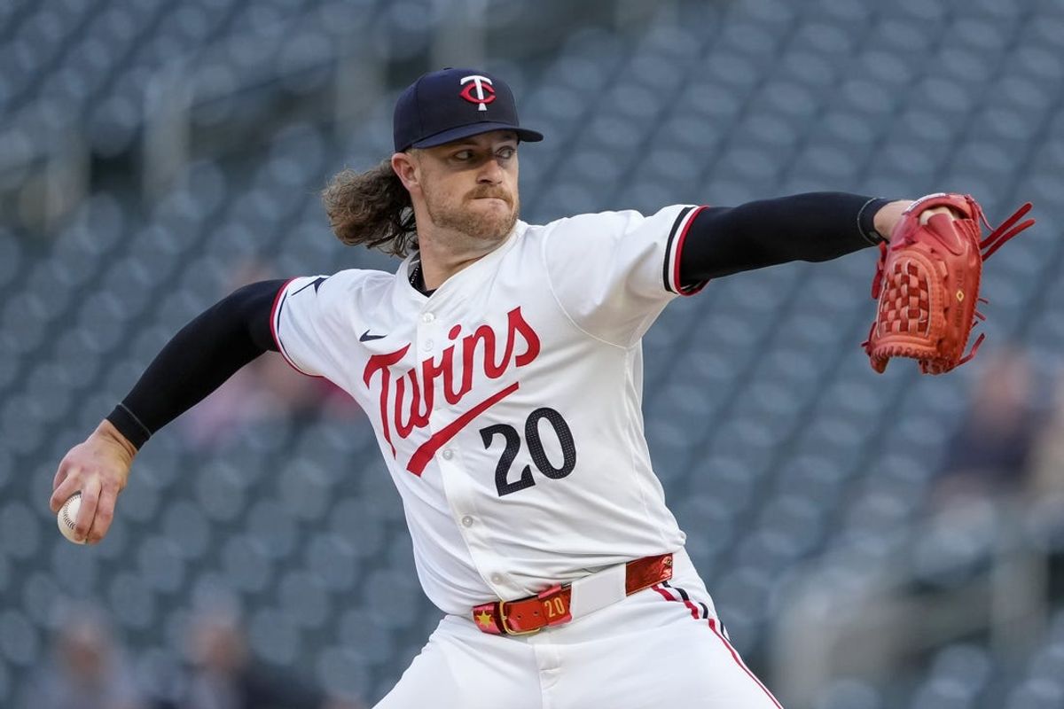 May 8, 2024; Minneapolis, Minnesota, USA; Minnesota Twins starting pitcher Chris Paddack (20) delivers a pitch against the Seattle Mariners in the first inning at Target Field. Mandatory Credit: Jesse Johnson-USA TODAY Sports