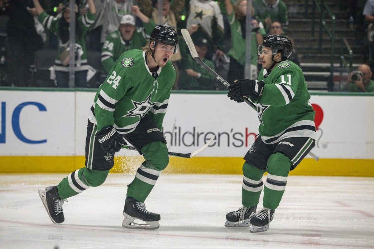 May 9, 2024; Dallas, Texas, USA; Dallas Stars center Roope Hintz (24) and center Logan Stankoven (11) celebrate after Hintz scores a goal against the Colorado Avalanche during the second period in game two of the second round of the 2024 Stanley Cup Playoffs at American Airlines Center. Mandatory Credit: Jerome Miron-USA TODAY Sports