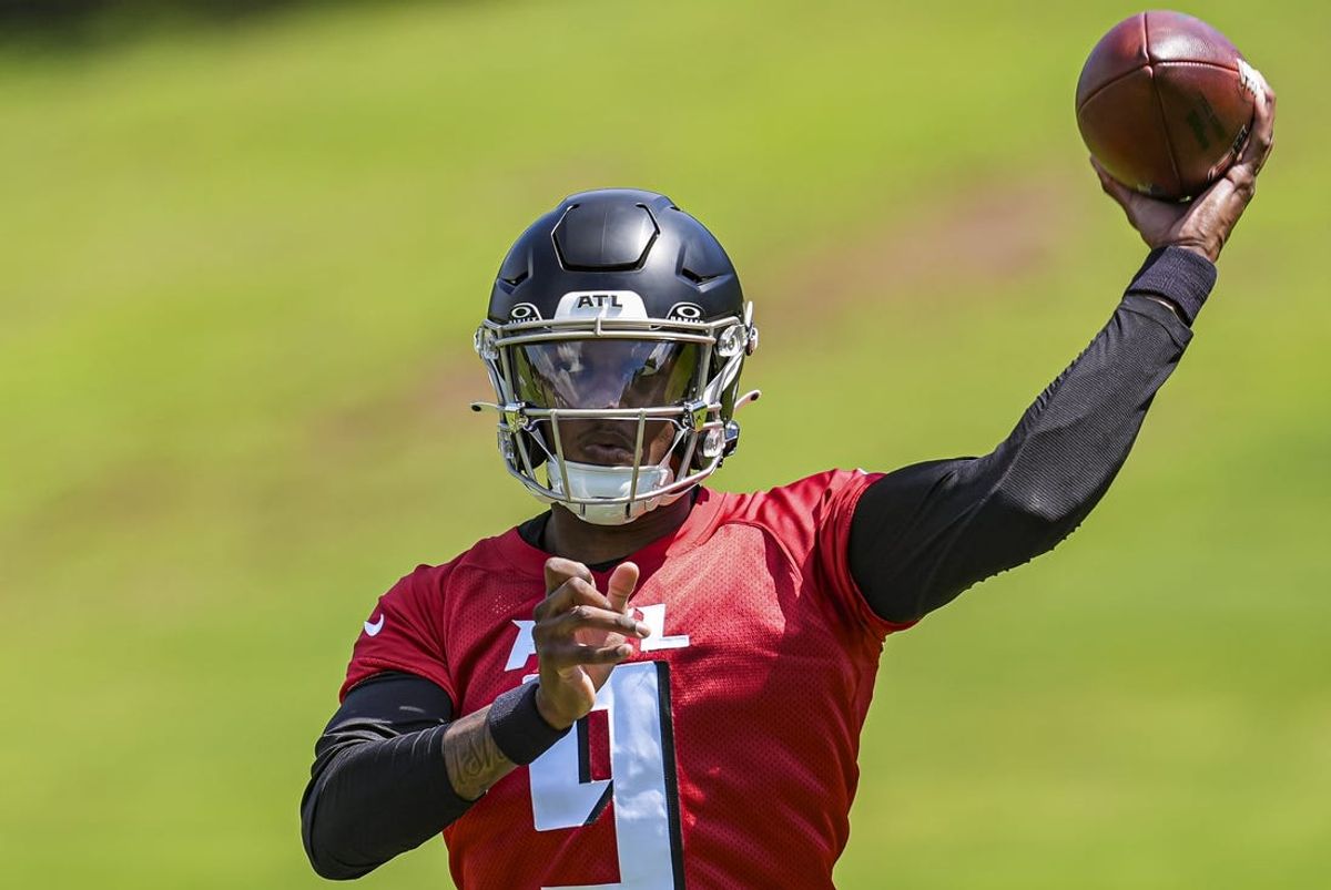 May 10, 2024; Flowery Branch, GA, USA; Atlanta Falcons quarterback Michael Penix Jr (9) passes the ball during Rookie Minicamp at the Falcons Training Camp.   Mandatory Credit: Dale Zanine-USA TODAY Sports
