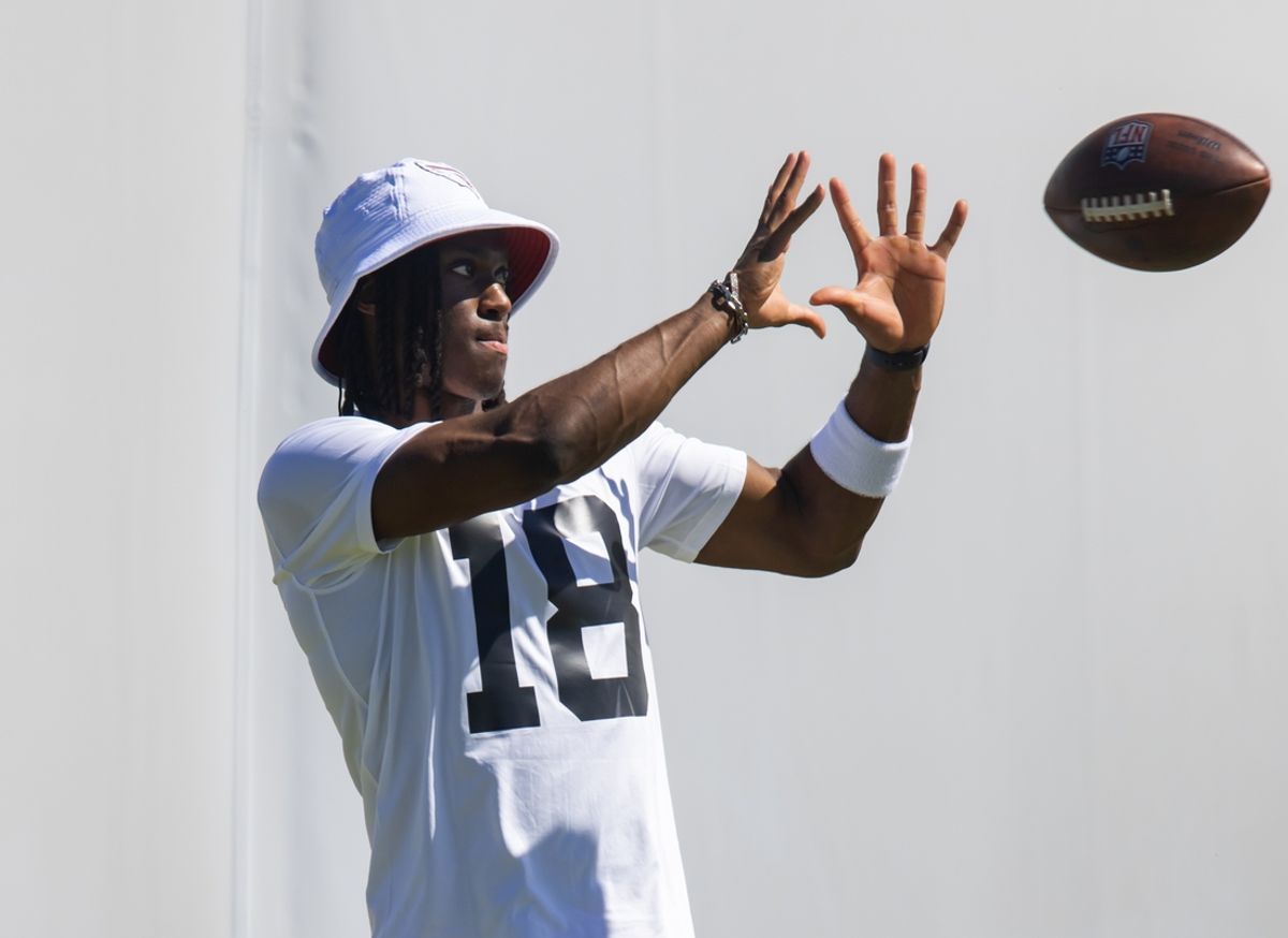 May 10, 2024; Tempe, AZ, USA; Arizona Cardinals wide receiver Marvin Harrison Jr. (18) catches a pass during rookie minicamp at the teams Tempe Training Facility. Mandatory Credit: Mark J. Rebilas-USA TODAY Sports