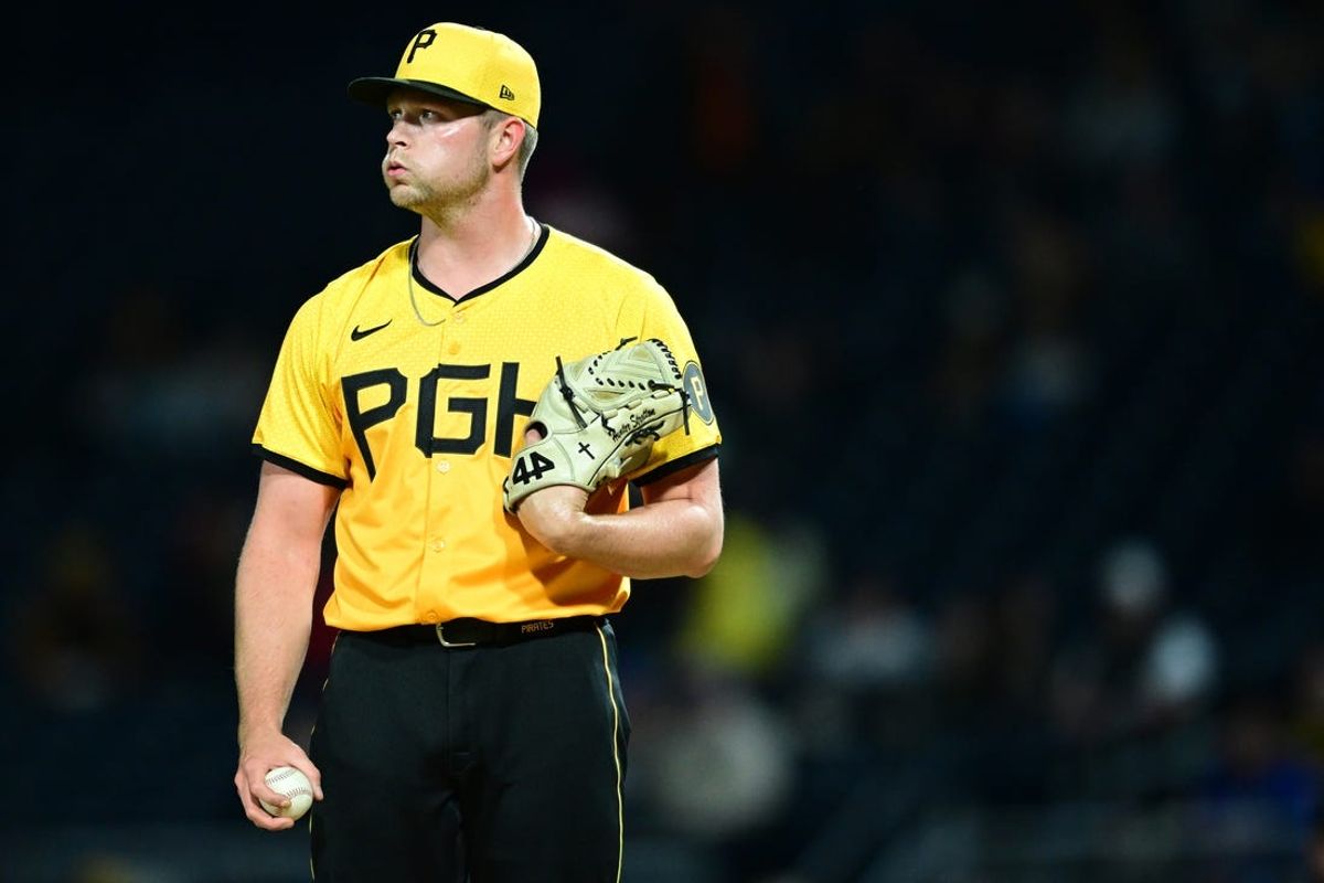 May 10, 2024; Pittsburgh, Pennsylvania, USA; Pittsburgh Pirates relief pitcher Hunter Stratton (63) reacts after an RBI double by Chicago Cubs left fielder Ian Happ (not shown) in the seventh inning at PNC Park. Mandatory Credit: David Dermer-USA TODAY Sports