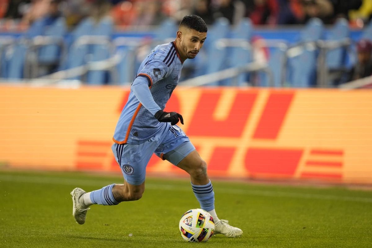 May 11, 2024; Toronto, Ontario, CAN;  New York City FC forward Santiago Rodriguez (10) dribbles the ball during the second half against Toronto FC at BMO Field. Mandatory Credit: John E. Sokolowski-USA TODAY Sports