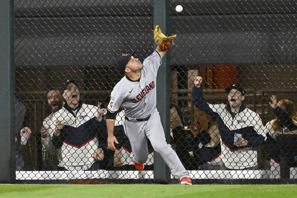 May 11, 2024; Chicago, Illinois, USA;  Cleveland Guardians outfielder Ramón Laureano (10) cannot make a play on a ball hit for a  double hit by Chicago White Sox designated hitter Eloy Jiménez (not pictured) during the eighth inning at Guaranteed Rate Field. Mandatory Credit: Matt Marton-USA TODAY Sports
