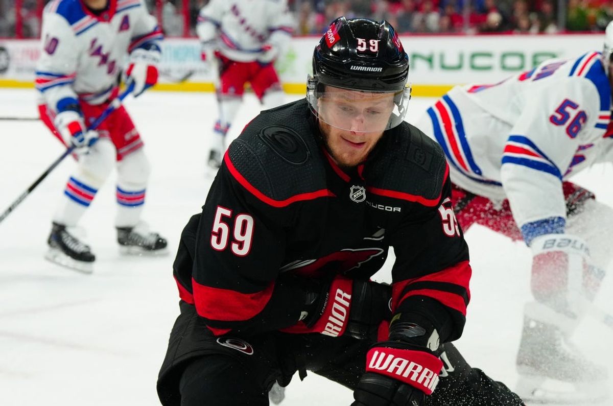 May 11, 2024; Raleigh, North Carolina, USA; Carolina Hurricanes center Jake Guentzel (59) skates with the puck against the New York Rangers during the first period in game four of the second round of the 2024 Stanley Cup Playoffs at PNC Arena. Mandatory Credit: James Guillory-USA TODAY Sports