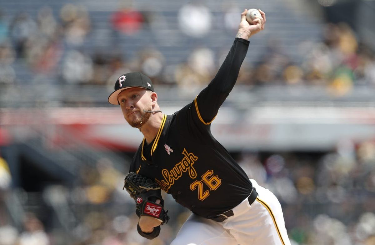 May 12, 2024; Pittsburgh, Pennsylvania, USA;  Pittsburgh Pirates starting pitcher Bailey Falter (26) delivers a pitch against the Chicago Cubs during the first inning at PNC Park. Mandatory Credit: Charles LeClaire-USA TODAY Sports