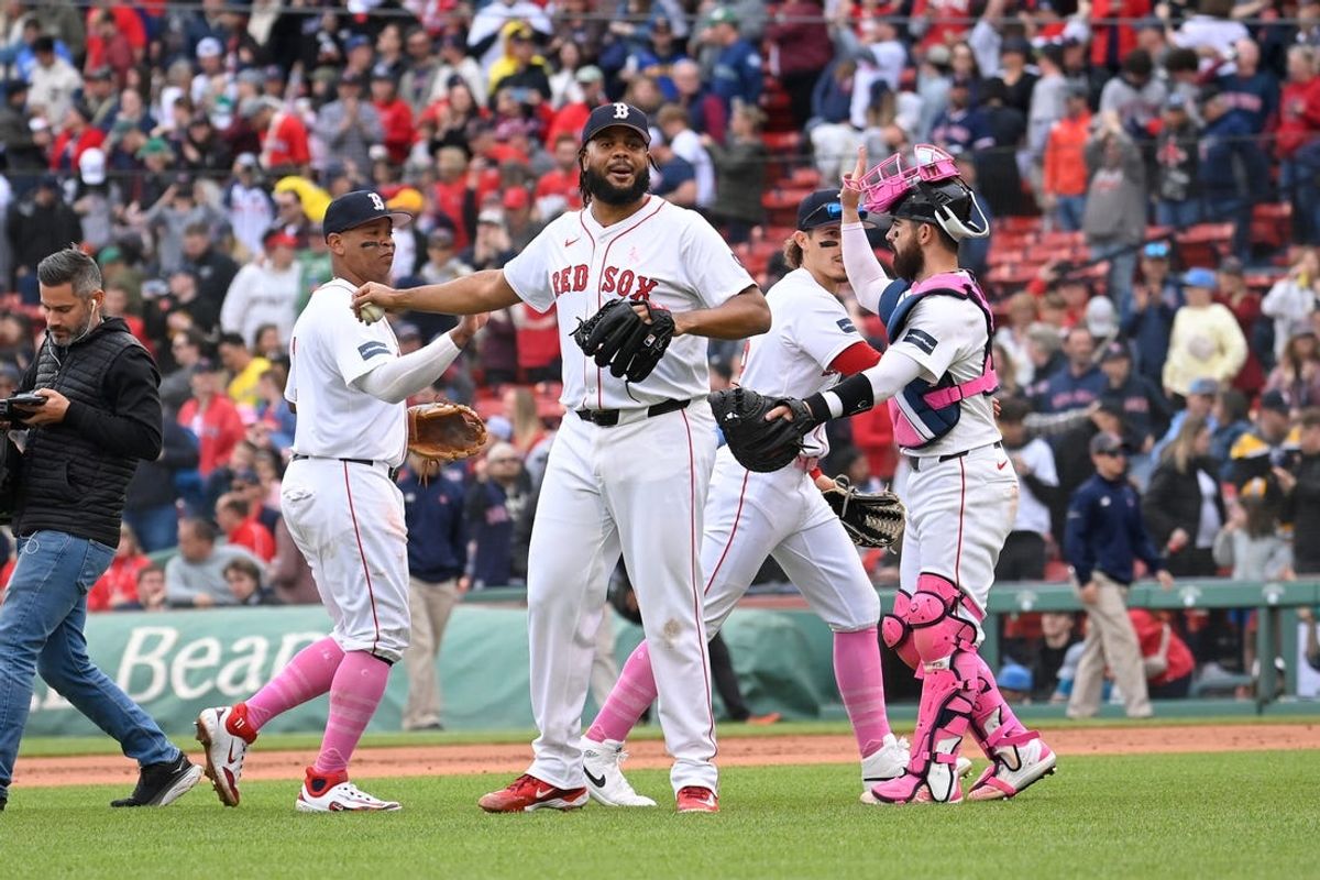 May 12, 2024; Boston, Massachusetts, USA;  Boston Red Sox pitcher Kenley Jansen (74) and catcher Connor Wong (12) react to the win against the Washington Nationals at Fenway Park. Mandatory Credit: Eric Canha-USA TODAY Sports