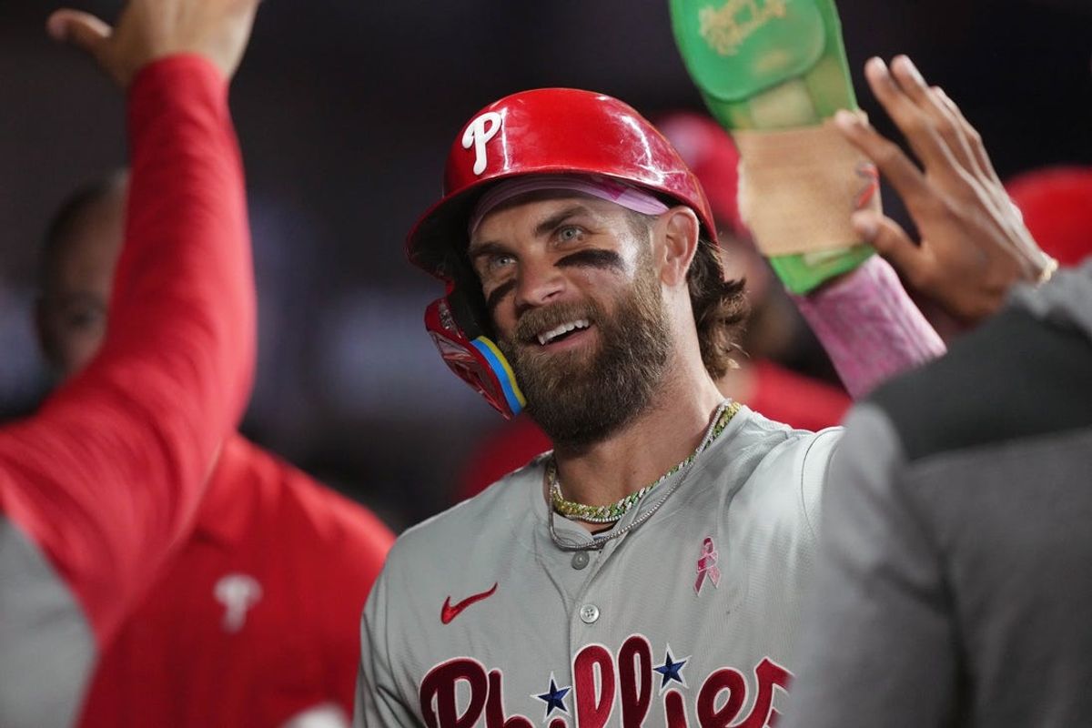 May 12, 2024; Miami, Florida, USA;  Philadelphia Phillies designated hitter Bryce Harper (3) celebrates scoring a run in the sixth inning against the Miami Marlins at loanDepot Park. Mandatory Credit: Jim Rassol-USA TODAY Sports