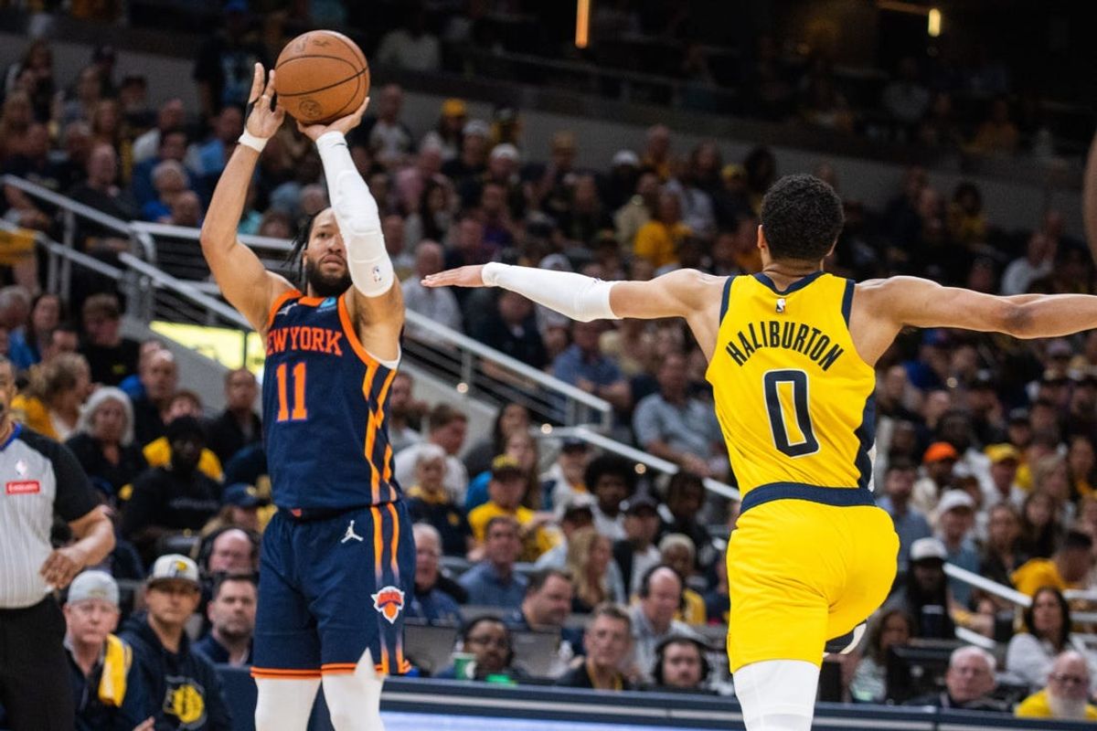 May 12, 2024; Indianapolis, Indiana, USA; New York Knicks guard Jalen Brunson (11) shoots the ball while Indiana Pacers guard Tyrese Haliburton (0) defends during game four of the second round for the 2024 NBA playoffs at Gainbridge Fieldhouse. Mandatory Credit: Trevor Ruszkowski-USA TODAY Sports