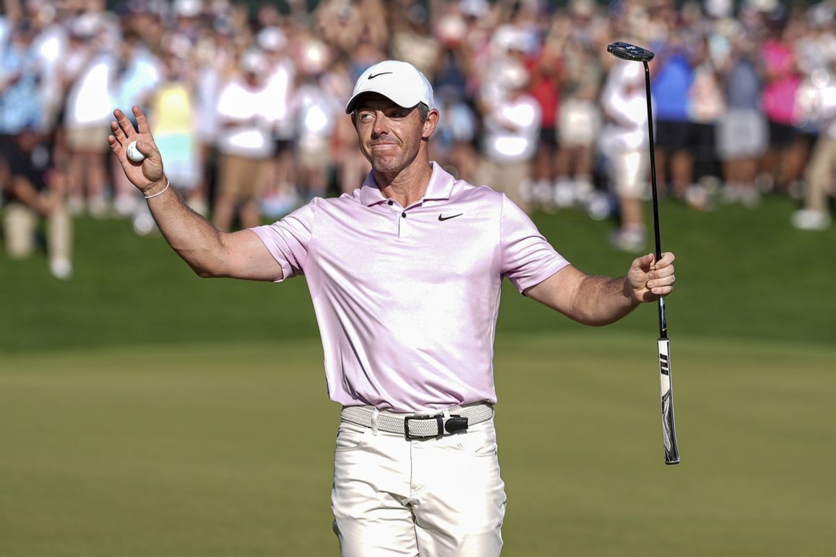 May 12, 2024; Charlotte, North Carolina, USA; Rory McIlroy acknowledges the gallery after his final putt and win during the final round of the Wells Fargo Championship golf tournament. Mandatory Credit: Jim Dedmon-USA TODAY Sports