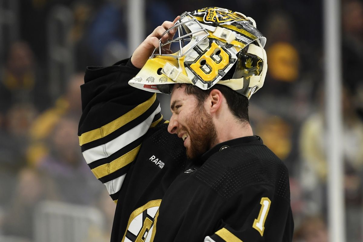 May 12, 2024; Boston, Massachusetts, USA; Boston Bruins goaltender Jeremy Swayman (1) slips on his mask during the second period in game four of the second round of the 2024 Stanley Cup Playoffs against the Florida Panthers at TD Garden. Mandatory Credit: Bob DeChiara-Imagn Images