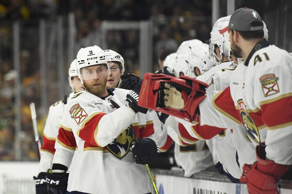 May 12, 2024; Boston, Massachusetts, USA; Florida Panthers center Sam Bennett (9) is congratulated by his teammates after scoring a goal during the third period in game four of the second round of the 2024 Stanley Cup Playoffs against the Boston Bruins at TD Garden. Mandatory Credit: Bob DeChiara-USA TODAY Sports