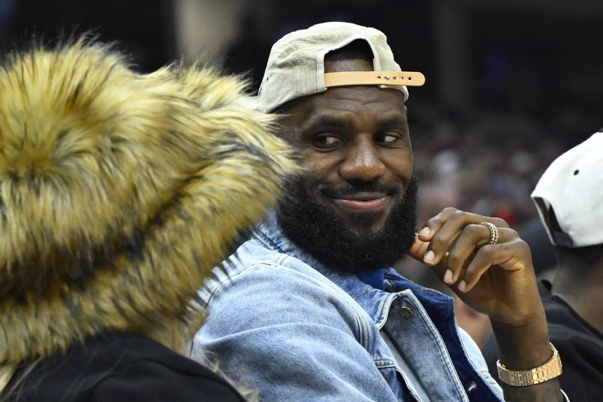 Los Angeles Lakers forward LeBron James looks at his wife Savannah James in the second quarter of game four of the second round for the 2024 NBA playoffs between the Cleveland Cavaliers and the Boston Celtics at Rocket Mortgage FieldHouse. Mandatory Credit: David Richard-USA TODAY Sports